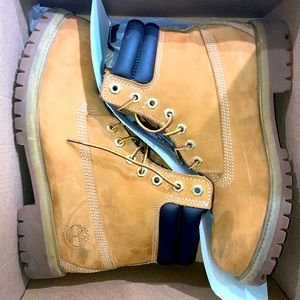 Worn Timberland boots.